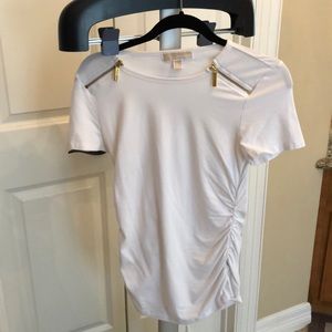 White with gold zippers